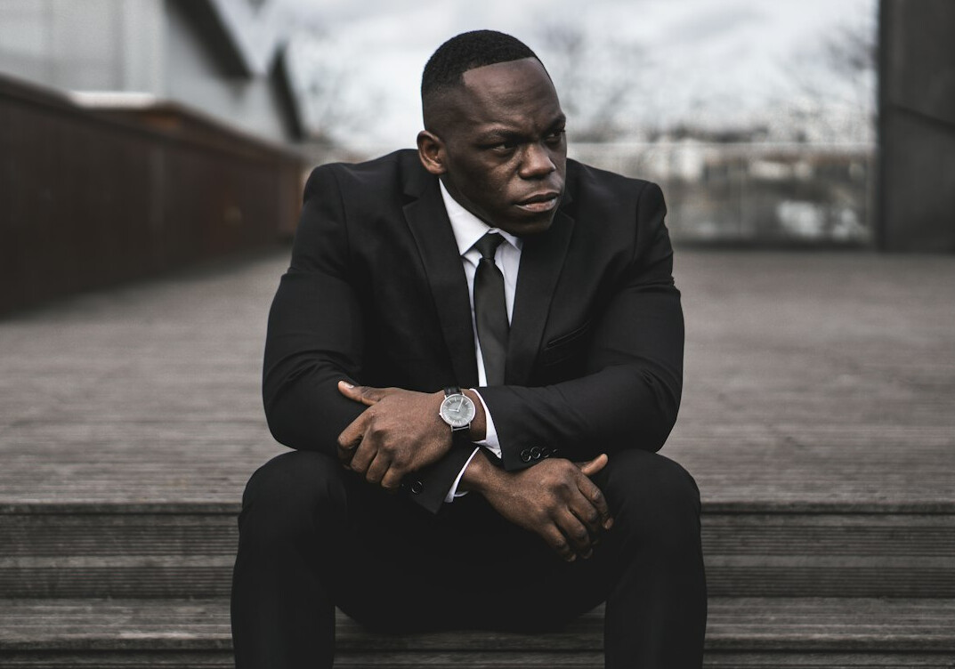 businessman in suit looking worried